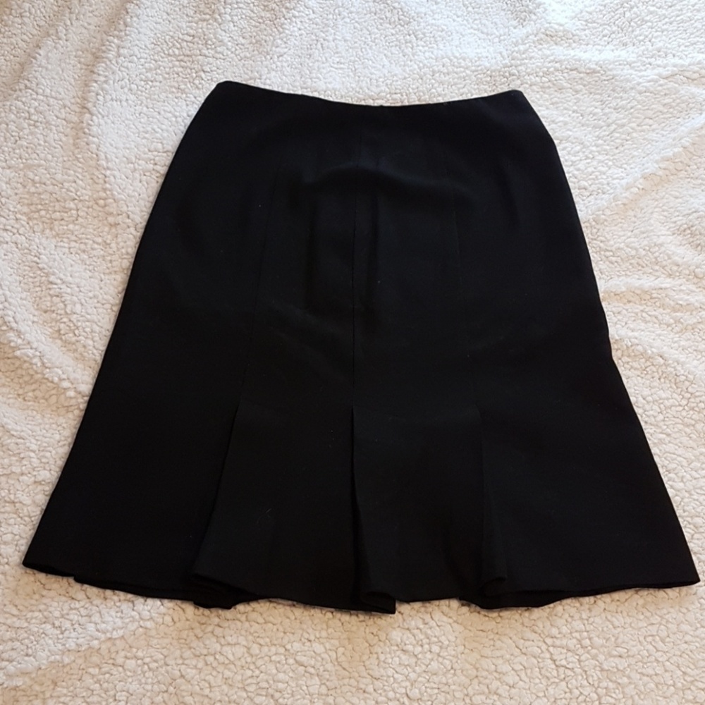 Black bottom pleated skirt.